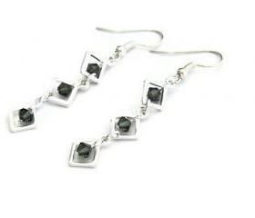 Swarovski dangle geometrical earrings.